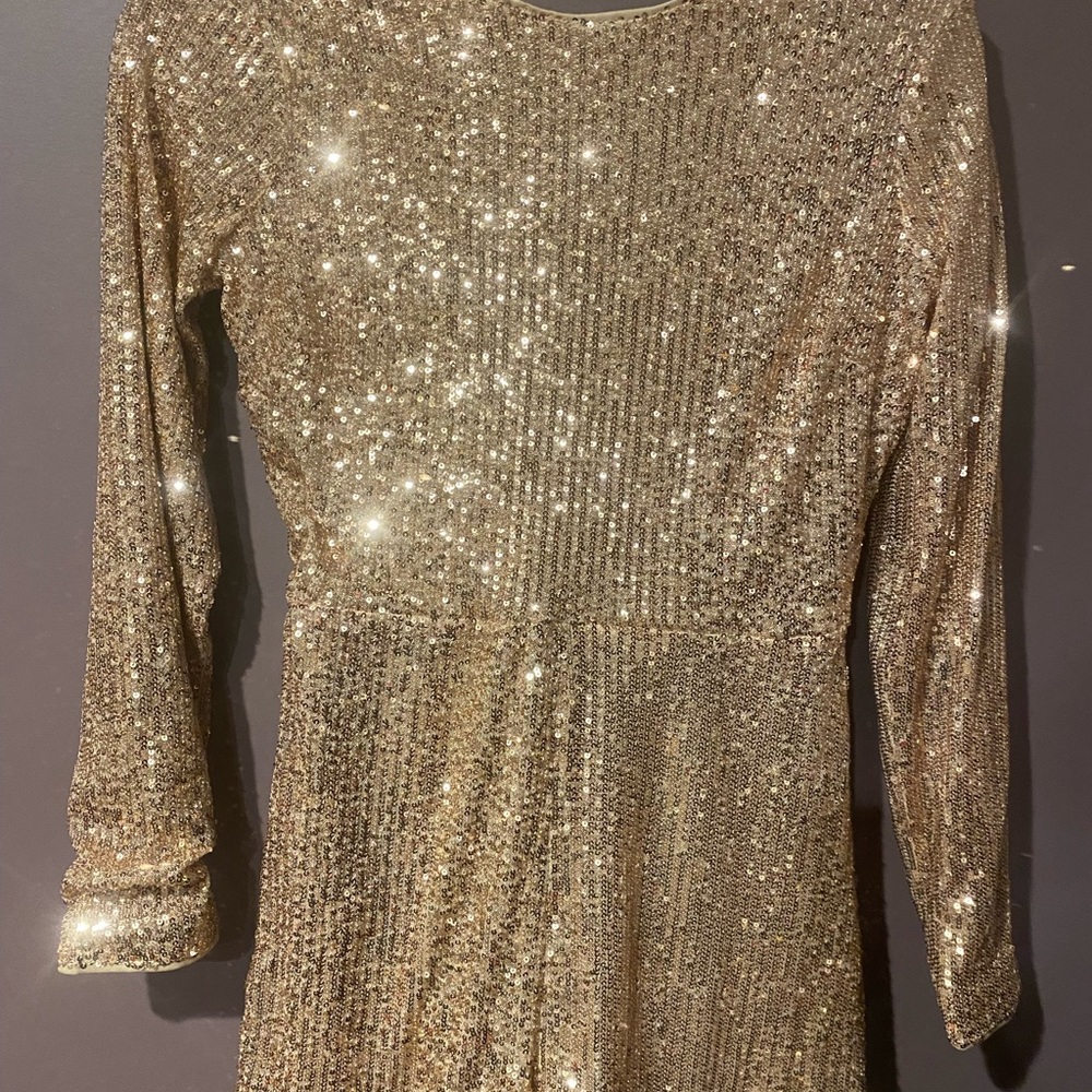 Gold sparkly short romper size M.